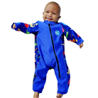 An image of the Bubble Tots Easy Zip Thermal Swimsuit in Blue Dinosaur design. The design features playful Dinosaurs and Eggs. The background colour is a bright vibrant tone with pops of vibrant Dinosaur illustrations