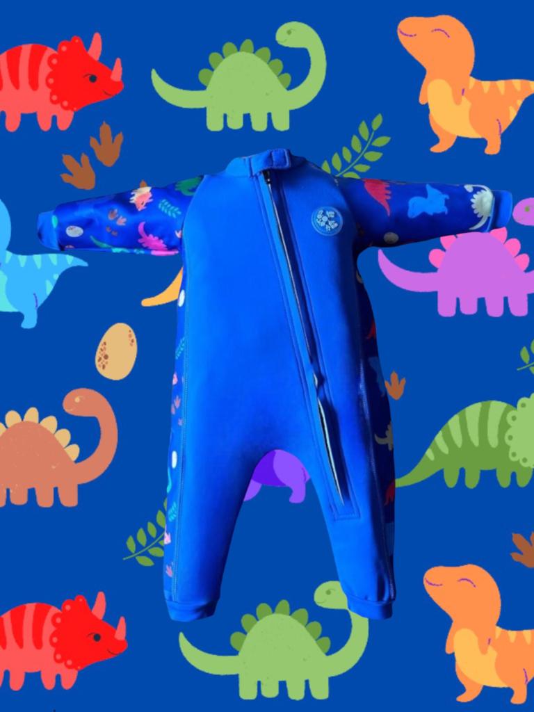 An image of the Bubble Tots Easy Zip Thermal Swimsuit in Blue Dinosaur design. The design features playful Dinosaurs and Eggs. The background colour is a bright vibrant tone with pops of vibrant Dinosaur illustrations