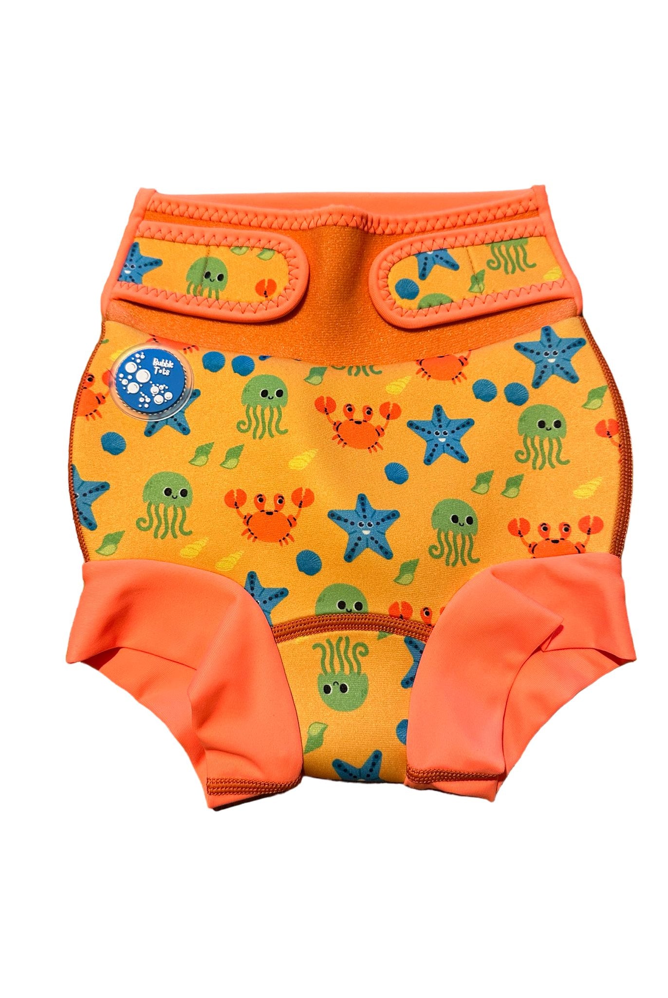 Bubble Tots Go Anywhere Swim Nappy Bright Orange Under The Sea Design An image of the Bubble Tots Go Anywhere Swim Nappy in Orange Under The Sea design. The design features playful Starfish, Jellyfish, Crabs and Shells..