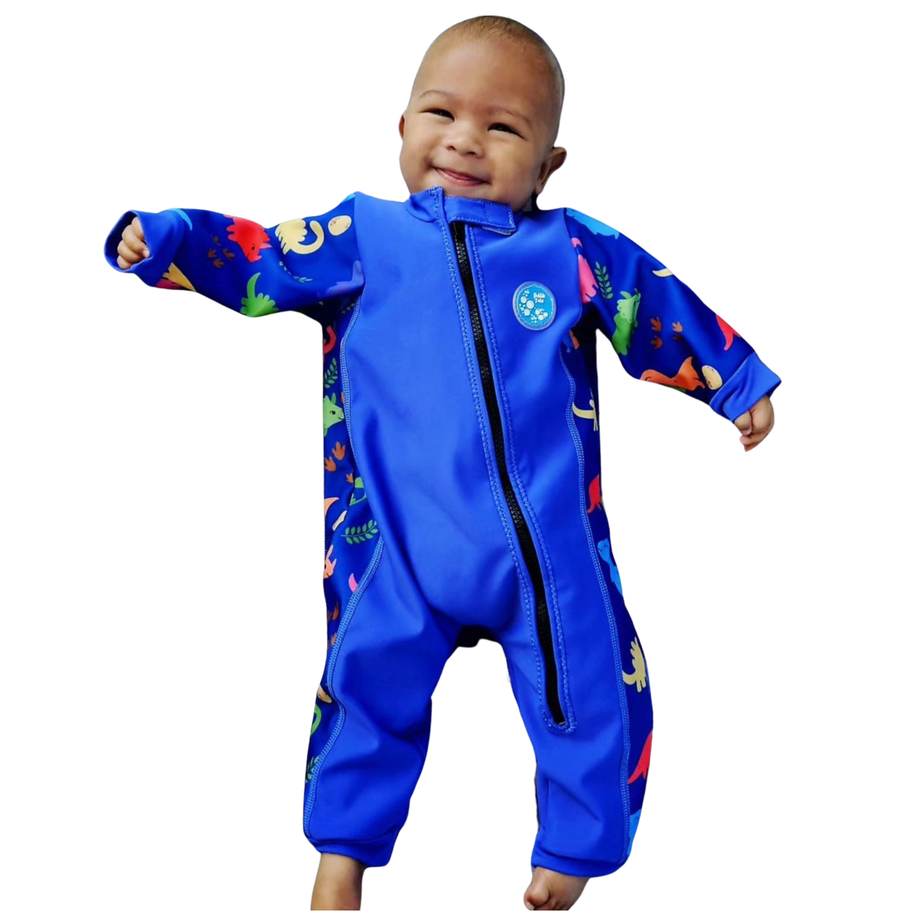 An image of the Bubble Tots Easy Zip Thermal Swimsuit in Blue Dinosaur design. The design features playful Dinosaurs and Eggs. The background colour is a bright vibrant tone with pops of vibrant Dinosaur illustrations