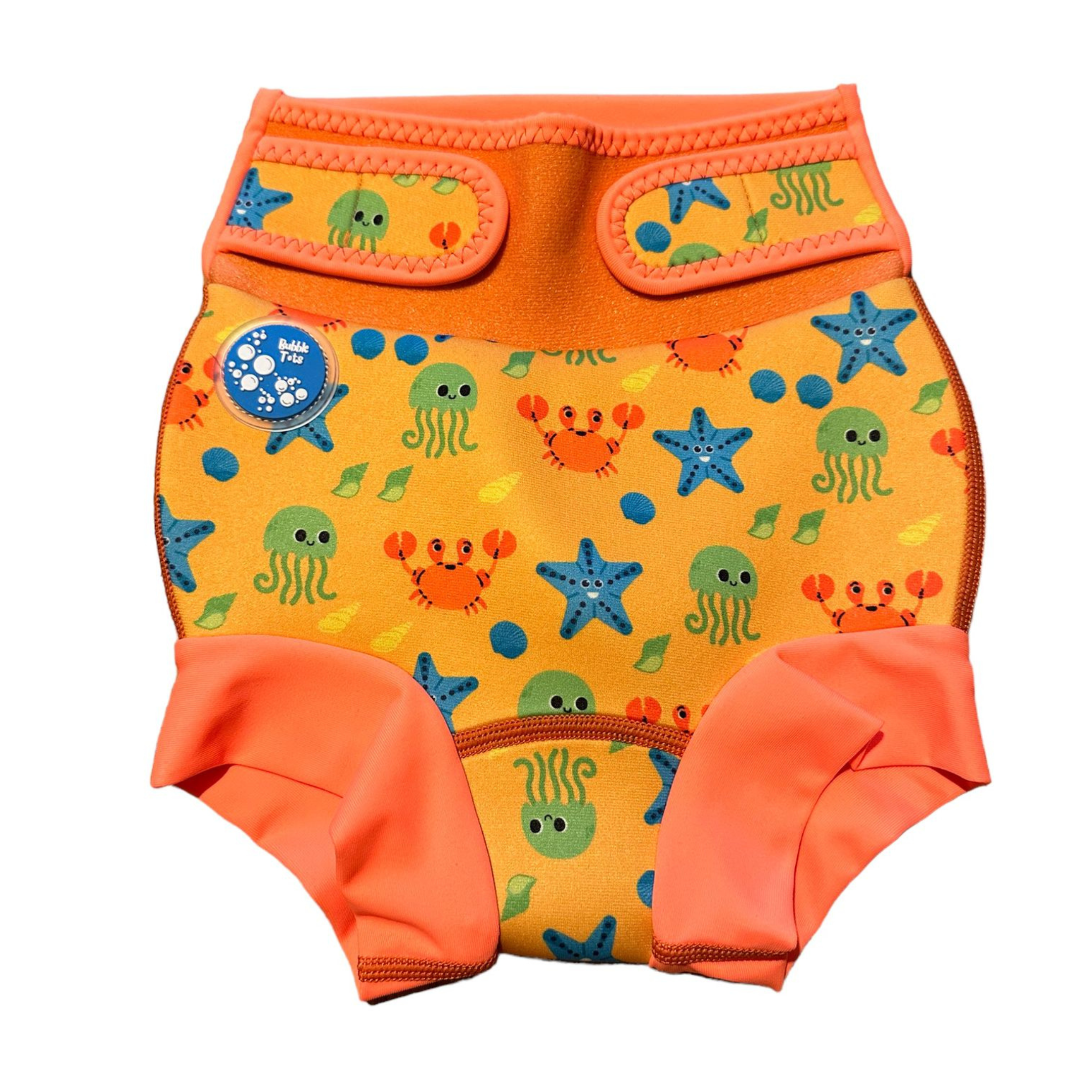 Bubble Tots Go Anywhere Swim Nappy Blue Dinosaurs Design An image of the Bubble Tots Go Anywhere Swim Nappy in Blue Dinosaurs design. The design features playful Dinosaurs, Eggs and Prints. 