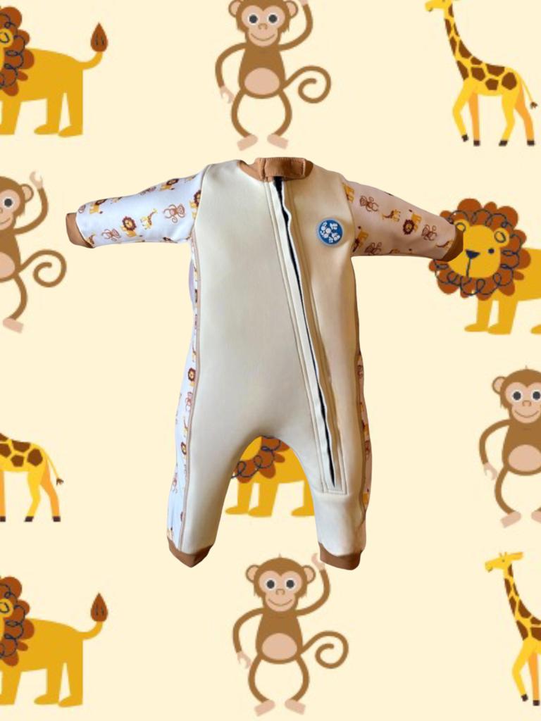 An image of the Bubble Tots Easy Zip Thermal Swimsuit in Yellow Beige Safari design. The design features playful Lions, Monkeys and Giraffes. The background colour is a soothing neutral tone with pops of vibrant Safari Animal illustrations