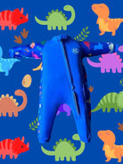 An image of the Bubble Tots Easy Zip Thermal Swimsuit in Blue Dinosaur design. The design features playful Dinosaurs and Eggs. The background colour is a bright vibrant tone with pops of vibrant Dinosaur illustrations